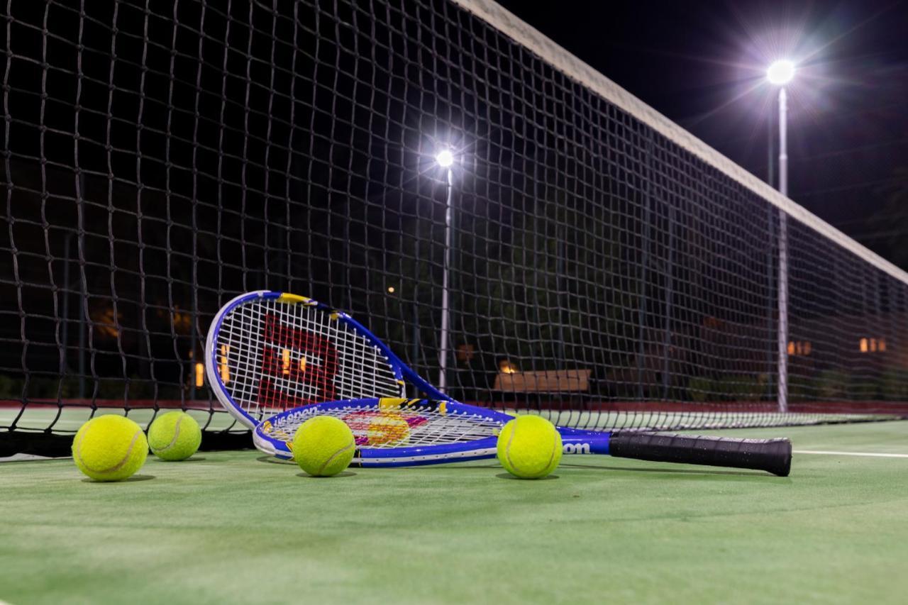 Sealine Beach, A Murwab Resort Mesaieed Exterior photo Tennis balls and racket